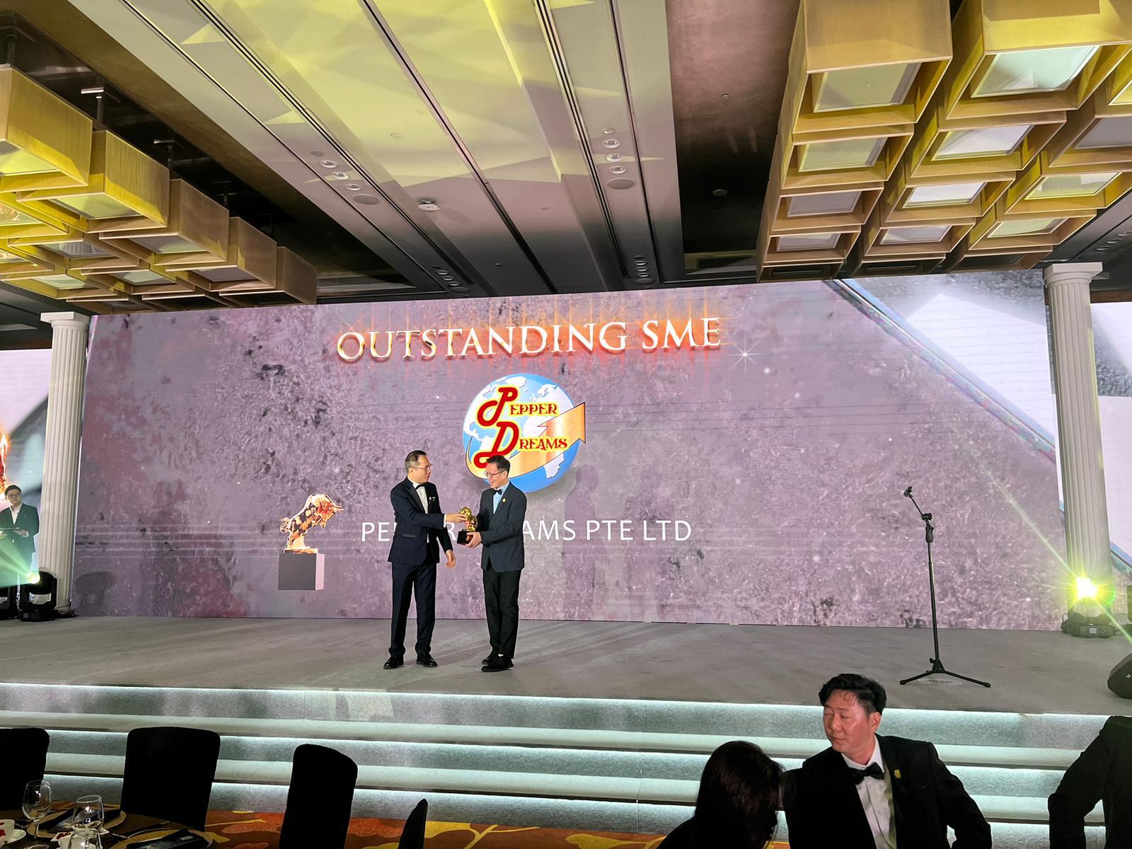Pepper Dreams receiving the Golden Bull Outstanding SME award